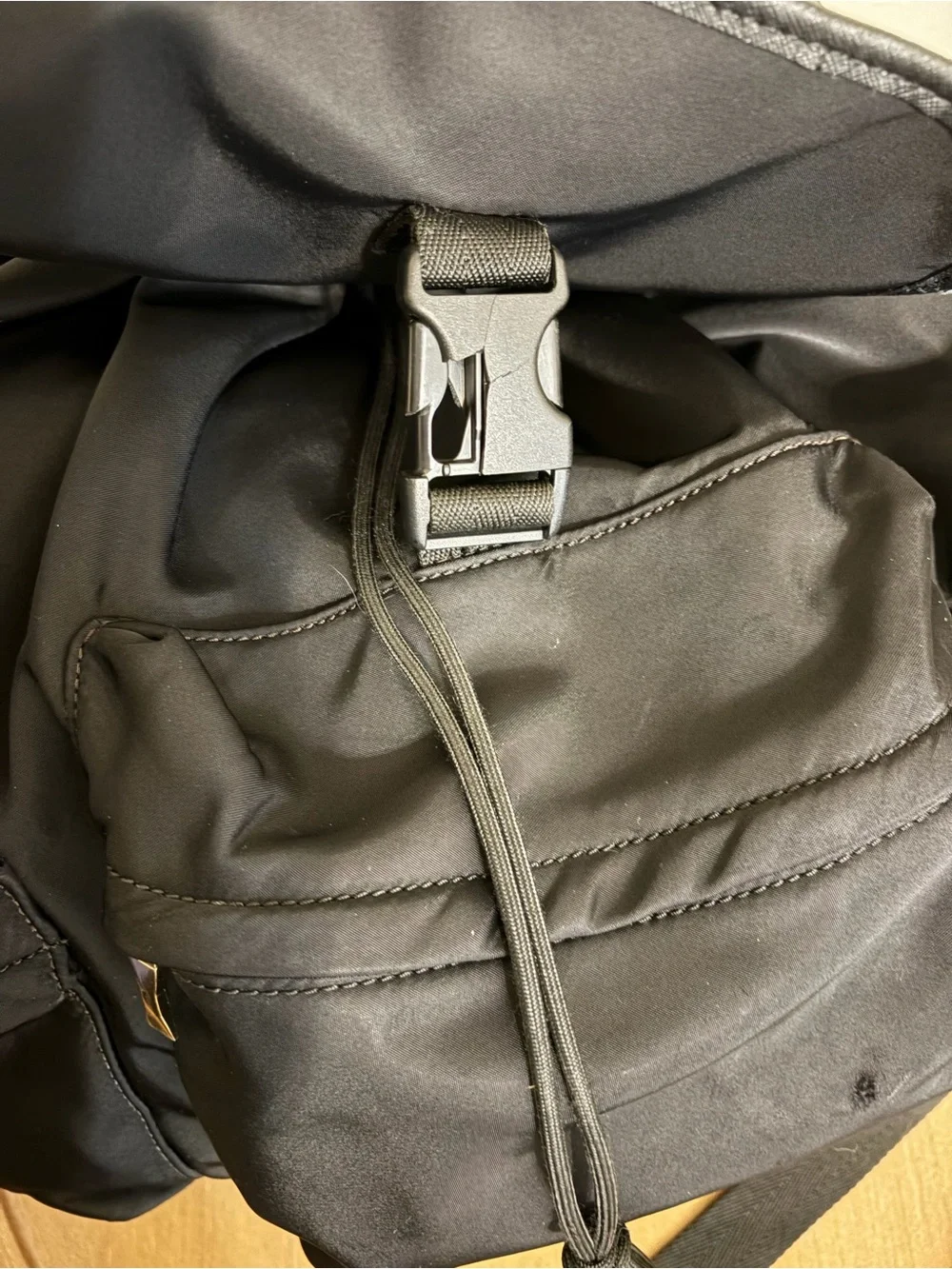 kate spade Black Nylon Drawstring Backpack with Gold Accents